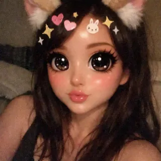 A selfie with a cartoon filter: cat ears, oversized eyes and stickers