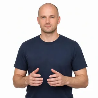 Waist-up photo of a man with both hands visible on a white background