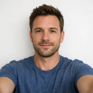 A selfie taken flat against a plain white wall