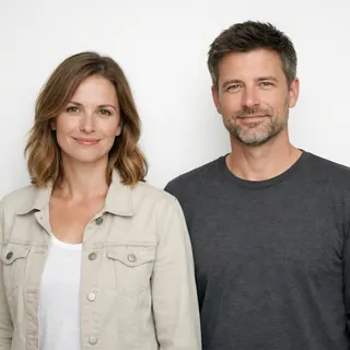 Two adults standing side by side with a gap between their heads