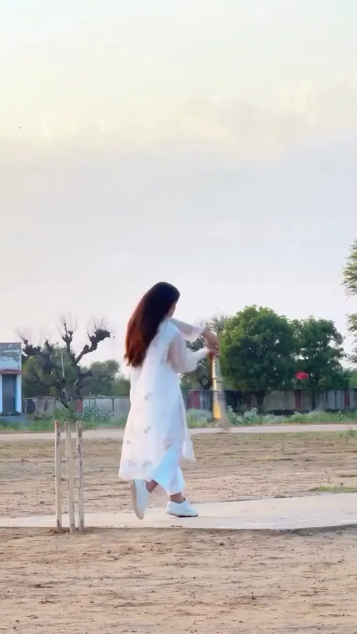 The batter drives the bat up through the line of the swing