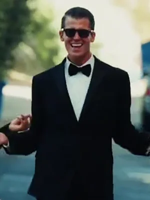 The center dancer in the example, in a black suit, white shirt and bow tie