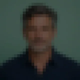 A dark, pixelated portrait that is hard to recognize