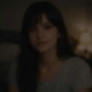 A dark, blurry portrait that is hard to recognize