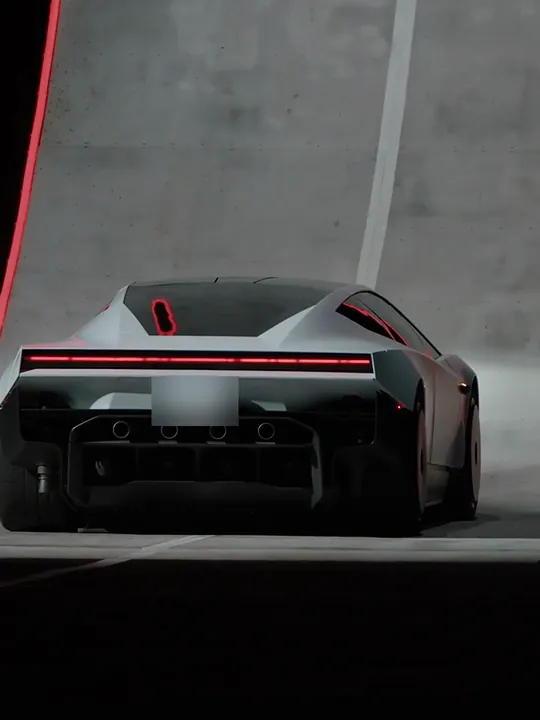 A white sports car parked at the foot of a curved concrete ramp at night, seen from behind