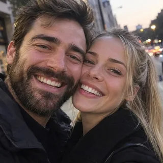 Two friends pressed cheek to cheek in a selfie, faces overlapping
